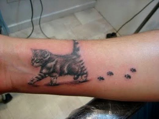 Значение татуировки с кошкой — фото
