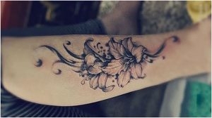 фото тату лилия от 19.11.2017 №042 - tattoo lily - tattoo-photo.ru