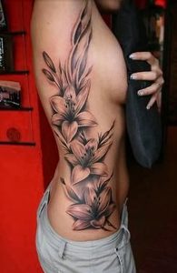 фото тату лилия от 19.11.2017 №097 - tattoo lily - tattoo-photo.ru