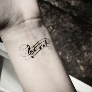 фото тату с нотами от 16.11.2017 №010 - tattoo with notes - tattoo-photo.ru