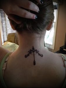 фото тату стрелец для статьи про значение символа в татуировке - 4