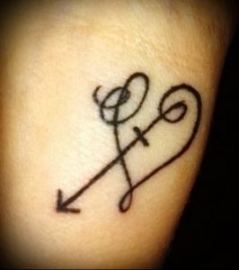 фото тату стрелец для статьи про значение символа в татуировке - 5