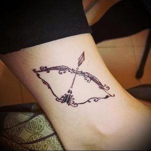 фото тату стрелец для статьи про значение символа в татуировке - 39