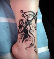 фото тату стрелец для статьи про значение символа в татуировке — 41
