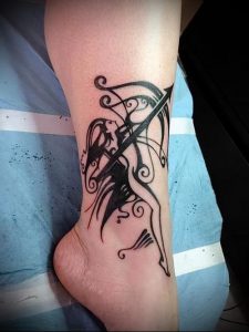 фото тату стрелец для статьи про значение символа в татуировке - 41