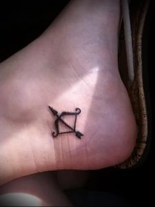 фото тату стрелец для статьи про значение символа в татуировке - 3