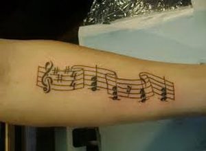 фото музыкальные тату от 08.03.2018 №059 - Musical Tattoos - tattoo-photo.ru