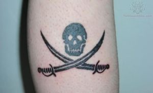 фото тату Веселый Роджер от 03.01.2018 №021 - tattoo Jolly Roger - tattoo-photo.ru