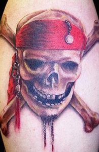 фото тату Веселый Роджер от 03.01.2018 №048 - tattoo Jolly Roger - tattoo-photo.ru