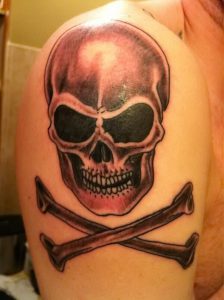 фото тату Веселый Роджер от 03.01.2018 №060 - tattoo Jolly Roger - tattoo-photo.ru