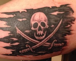 фото тату Веселый Роджер от 03.01.2018 №075 - tattoo Jolly Roger - tattoo-photo.ru