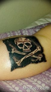 фото тату Веселый Роджер от 03.01.2018 №081 - tattoo Jolly Roger - tattoo-photo.ru