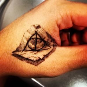 фото тату Дары Смерти от 20.02.2018 №090 - Deathly Tattoo - tattoo-photo.ru