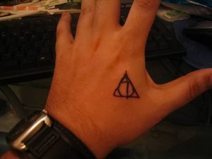 фото тату Дары Смерти от 20.02.2018 №094 - Deathly Tattoo - tattoo-photo.ru