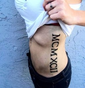 фото тату Римские цифры от 27.02.2018 №083 - tattoos Roman numerals - tattoo-photo.ru