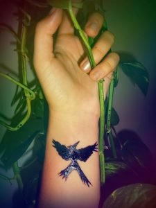 фото тату Сойка Пересмешница от 03.01.2018 №033 - Tattoo MOCKINGJAY - tattoo-photo.ru