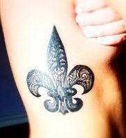 фото тату королевская лилия от 08.04.2018 №018 — tattoo royal lily — tattoo-photo.ru