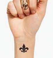 фото тату королевская лилия от 08.04.2018 №002 — tattoo royal lily — tattoo-photo.ru