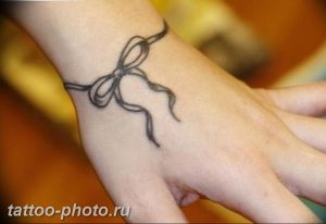 фото тату бантик 24.12.2018 №108 - photo tattoo bow - tattoo-photo.ru