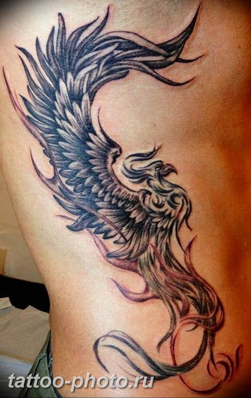 Phoenix rib tattoo ideas