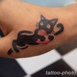 фото рисунка тату черная кошка 13.11.2018 №091 - black cat tattoo picture - tattoo-photo.ru