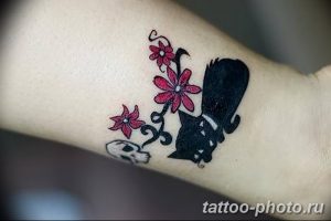 фото рисунка тату черная кошка 13.11.2018 №125 - black cat tattoo picture - tattoo-photo.ru