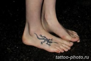 simple lizard tribal tattoo