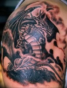 Фото рисунка тату дракон 12.10.2018 №042 - dragon tattoo - tattoo-photo.ru