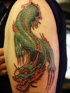 Фото рисунка тату дракон 12.10.2018 №043 - dragon tattoo - tattoo-photo.ru