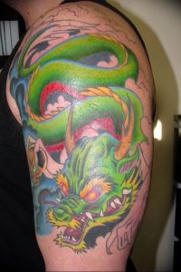 Фото рисунка тату дракон 12.10.2018 №071 - dragon tattoo - tattoo-photo.ru