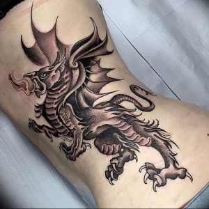 Фото рисунка тату дракон 12.10.2018 №093 - dragon tattoo - tattoo-photo.ru