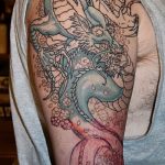 Фото рисунка тату дракон 12.10.2018 №186 - dragon tattoo - tattoo-photo.ru