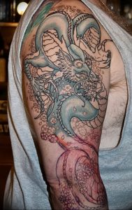Фото рисунка тату дракон 12.10.2018 №186 - dragon tattoo - tattoo-photo.ru