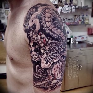 Фото рисунка тату дракон 12.10.2018 №192 - dragon tattoo - tattoo-photo.ru