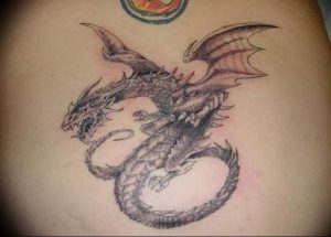 Фото рисунка тату дракон 12.10.2018 №210 - dragon tattoo - tattoo-photo.ru