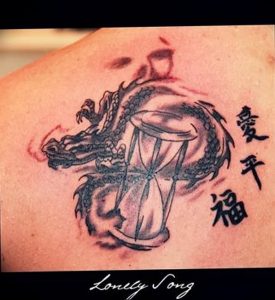 Фото рисунка тату дракон 12.10.2018 №233 - dragon tattoo - tattoo-photo.ru