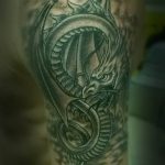 Фото рисунка тату дракон 12.10.2018 №277 - dragon tattoo - tattoo-photo.ru