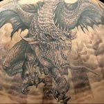 Фото рисунка тату дракон 12.10.2018 №286 - dragon tattoo - tattoo-photo.ru