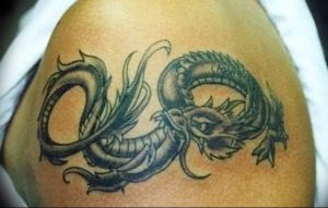 Фото рисунка тату дракон 12.10.2018 №314 - dragon tattoo - tattoo-photo.ru