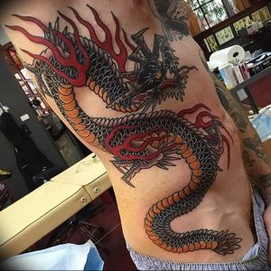 Фото рисунка тату дракон 12.10.2018 №331 - dragon tattoo - tattoo-photo.ru