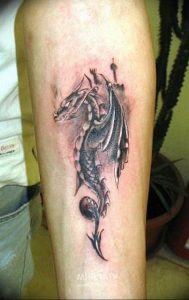 Фото рисунка тату дракон 12.10.2018 №386 - dragon tattoo - tattoo-photo.ru
