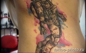 Фото рисунка тату космонавт 31.10.2018 №080 - cosmonaut tattoo - tattoo-photo.ru