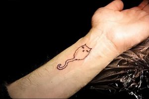 Фото рисунка тату кошка 09.10.2018 №077 - cat tattoo - tattoo-photo.ru