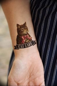 Фото рисунка тату кошка 09.10.2018 №104 - cat tattoo - tattoo-photo.ru