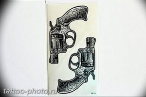 фото тату револьвер 24.12.2018 №023 - photo tattoo revolver - tattoo-photo.ru