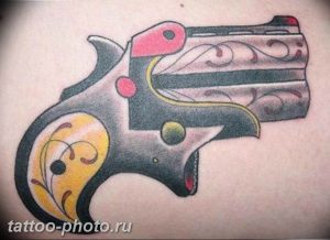 фото тату револьвер 24.12.2018 №078 - photo tattoo revolver - tattoo-photo.ru