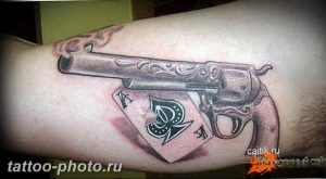 фото тату револьвер 24.12.2018 №099 - photo tattoo revolver - tattoo-photo.ru