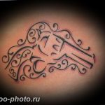 фото тату револьвер 24.12.2018 №111 - photo tattoo revolver - tattoo-photo.ru