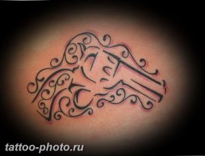 фото тату револьвер 24.12.2018 №111 - photo tattoo revolver - tattoo-photo.ru