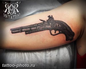 фото тату револьвер 24.12.2018 №126 - photo tattoo revolver - tattoo-photo.ru